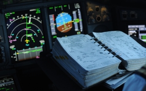 Vale to the paper aviation naviagtion airport charts that Airlines have used for almost a century. Airlines are replacing paper with iPads and tablet PCs. (Photo courtesy Richard de Crespigny)